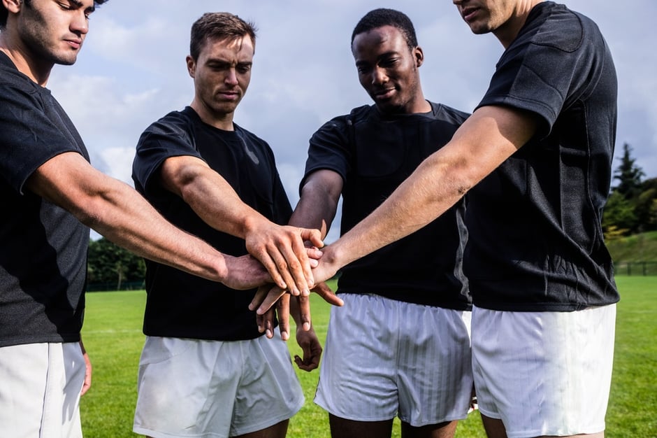 Rugby players standing together before match at the park-1.jpeg